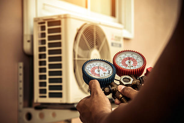 Professional Heat Pump Repair technician working in Stanhope, NJ